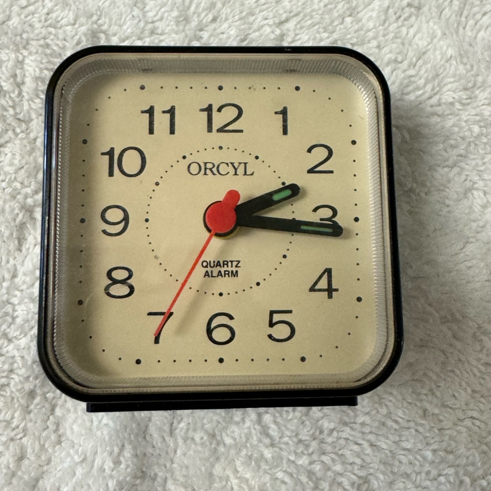 Hand held alarm clock.
